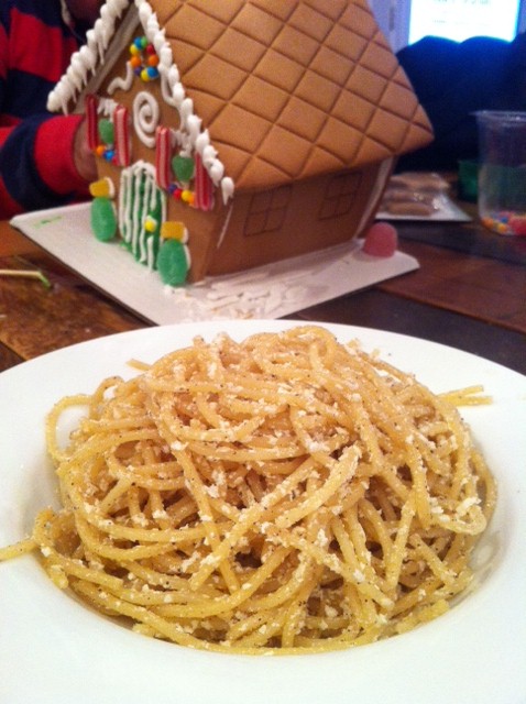Holiday Myzithra Pasta! Simple, quick, light and very delicious! Perfect for the holidays....Mark decorating his side of the gingerbread house in the background :0)