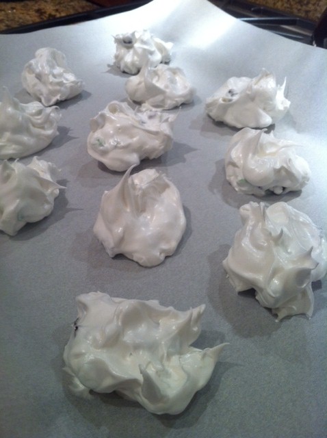 Use a quarter cup to drop the meringues on the baking sheets